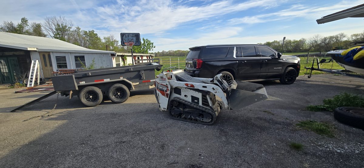 Bobcat mini loader and equipment trailer