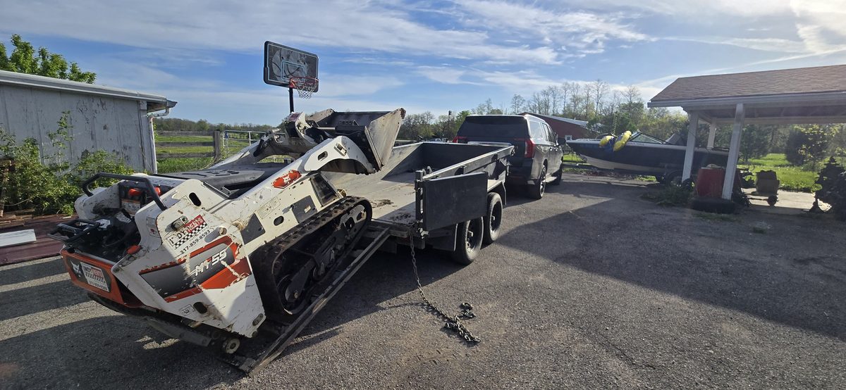 Bobcat mini loader and equipment trailer