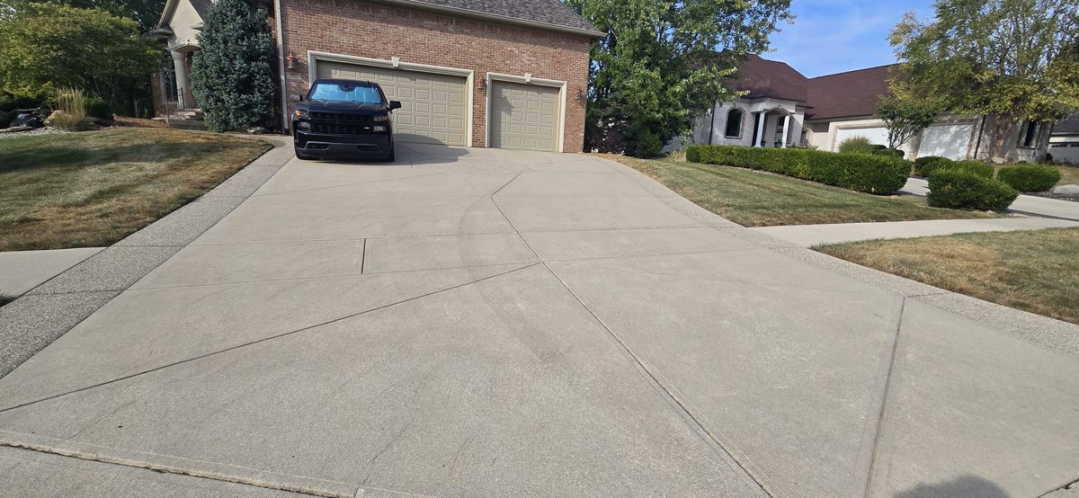 Neighborhood curb after pressure washing