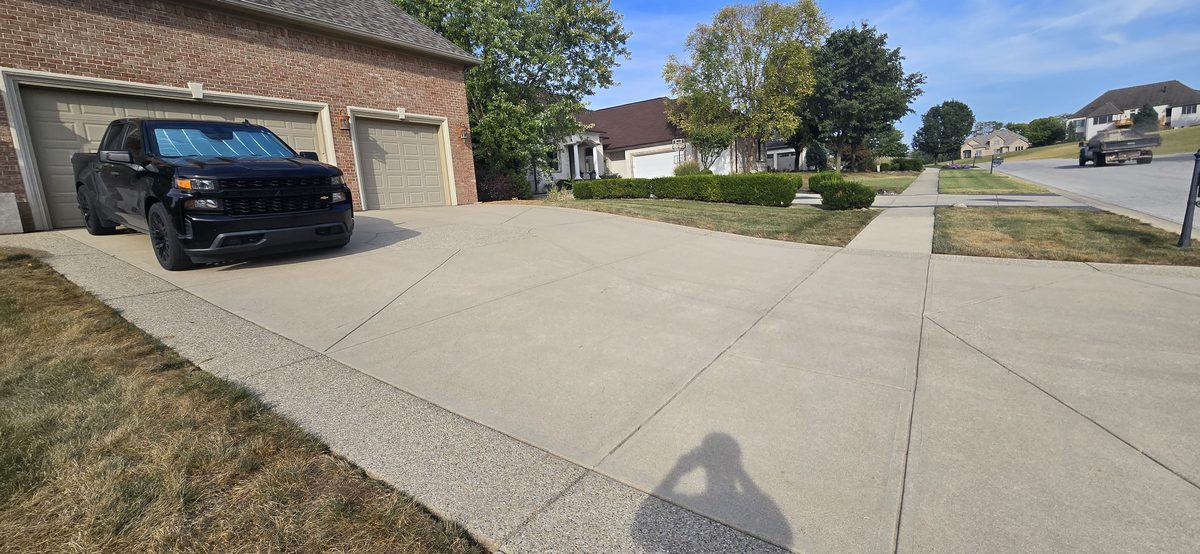 Neighborhood curb after pressure washing