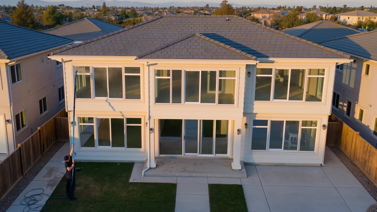 Window cleaning on two-story home