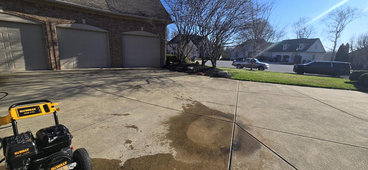 Power washing driveway in progress